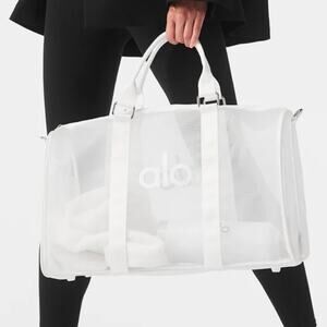 ALO Yoga White Sheer Duffel Bag with Sleek Design $228